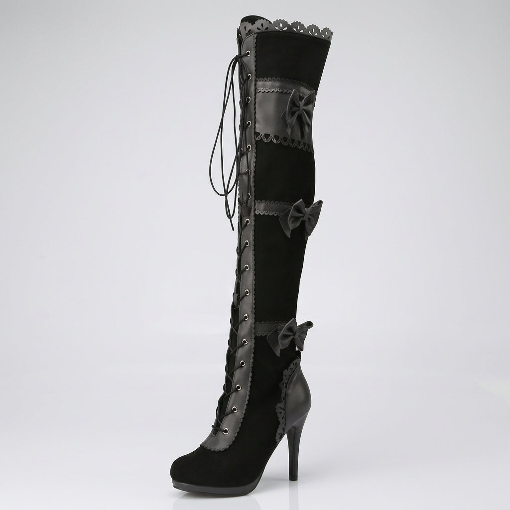 Black knee-high boots with decorative elements on a white background