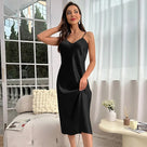 A Woman Unfolds Nightdress